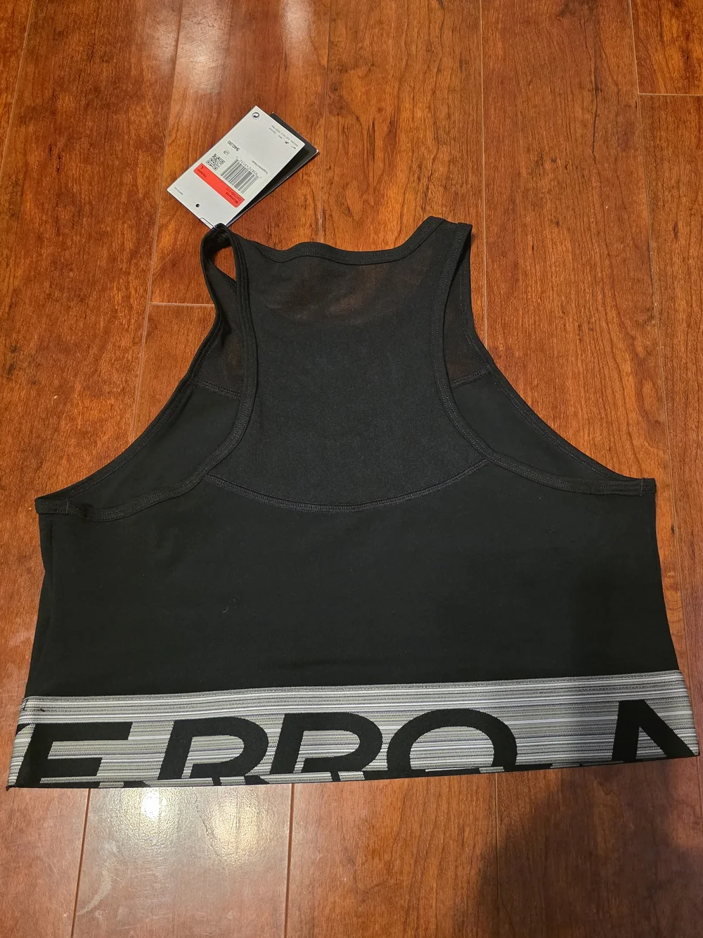 Nike Black Mesh-Panel Crop Sports Bra with White Swoosh
